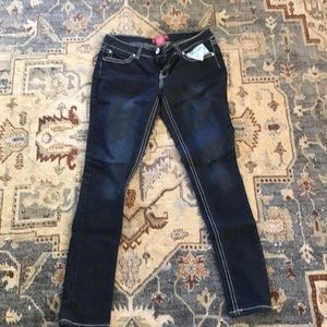 Red rivet skinny jeans